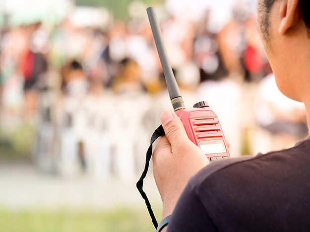 Person using handheld radio