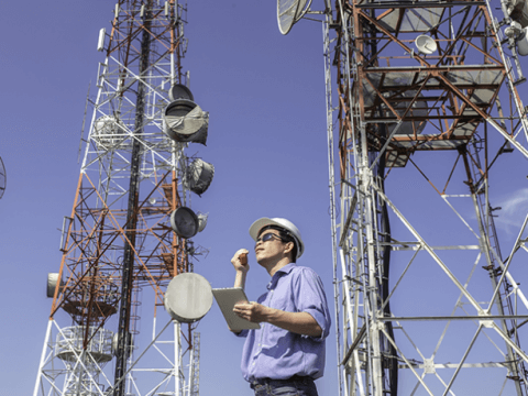 Man using handheld two-way radio