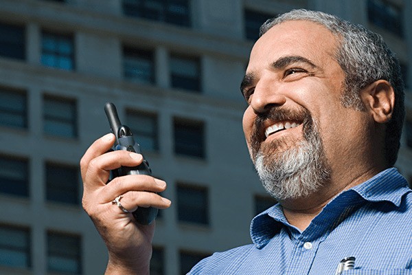 Man talking on a radio